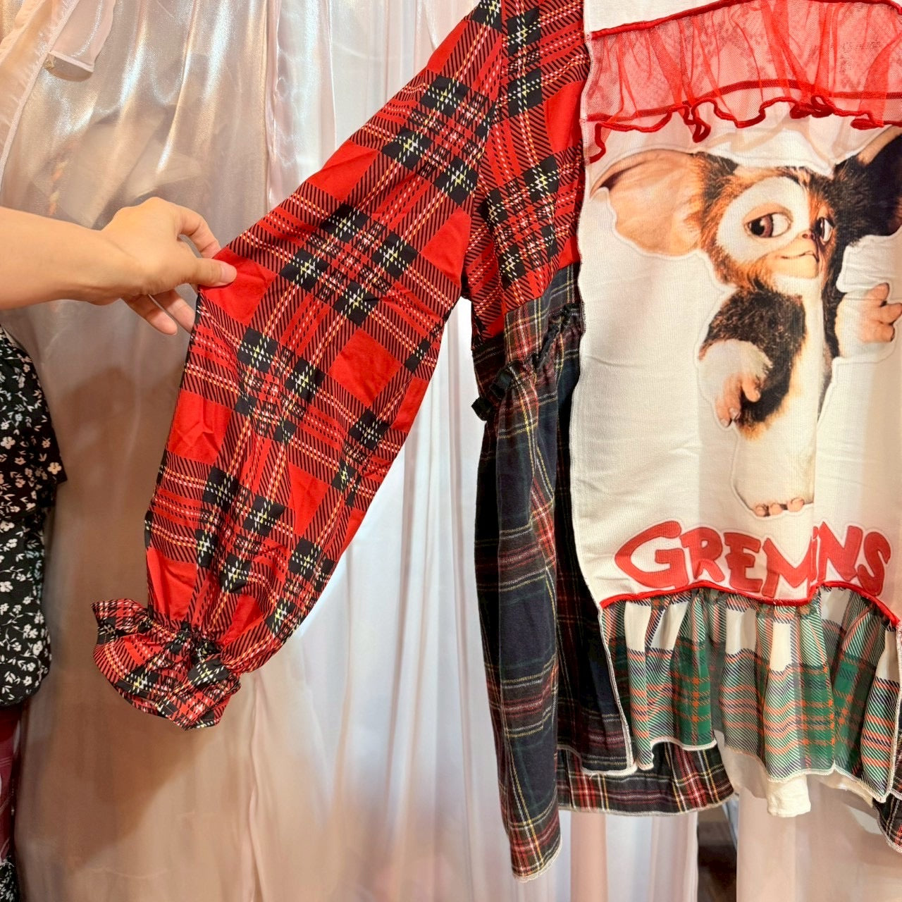 グレムリンのチェック柄トップス
