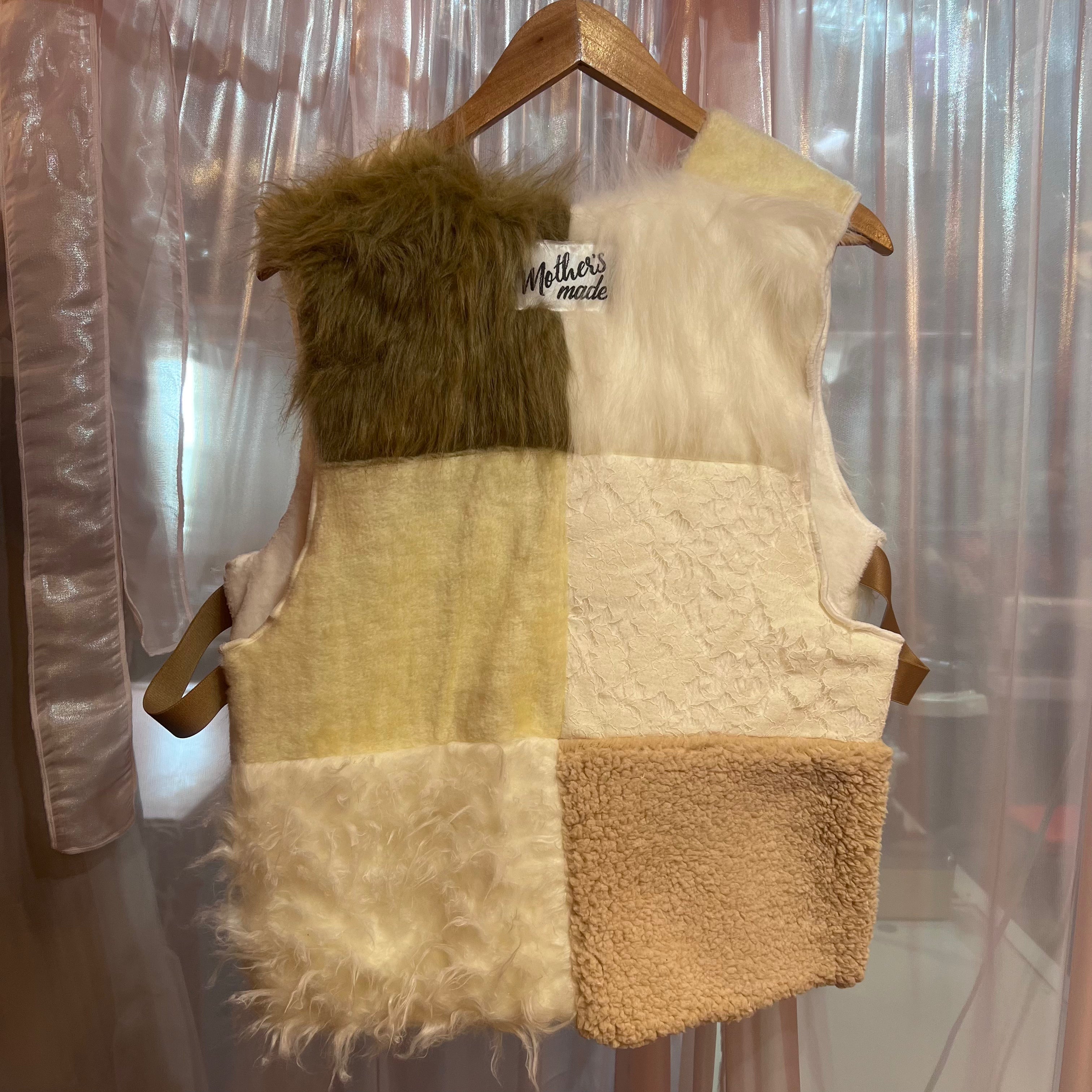 ファー xニットのパッチワークベスト